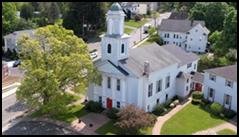 A white church with a steeple

AI-generated content may be incorrect.